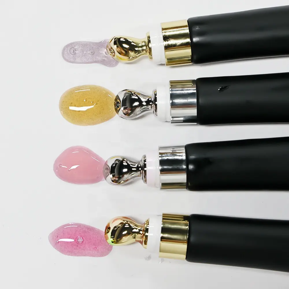 Custom Vegan Zinc Alloy Squeeze Plumping Lip Gloss Lip Oil Hyaluronic Acid Moisturizing Nourishing Tinted Lip Oil Private Label
